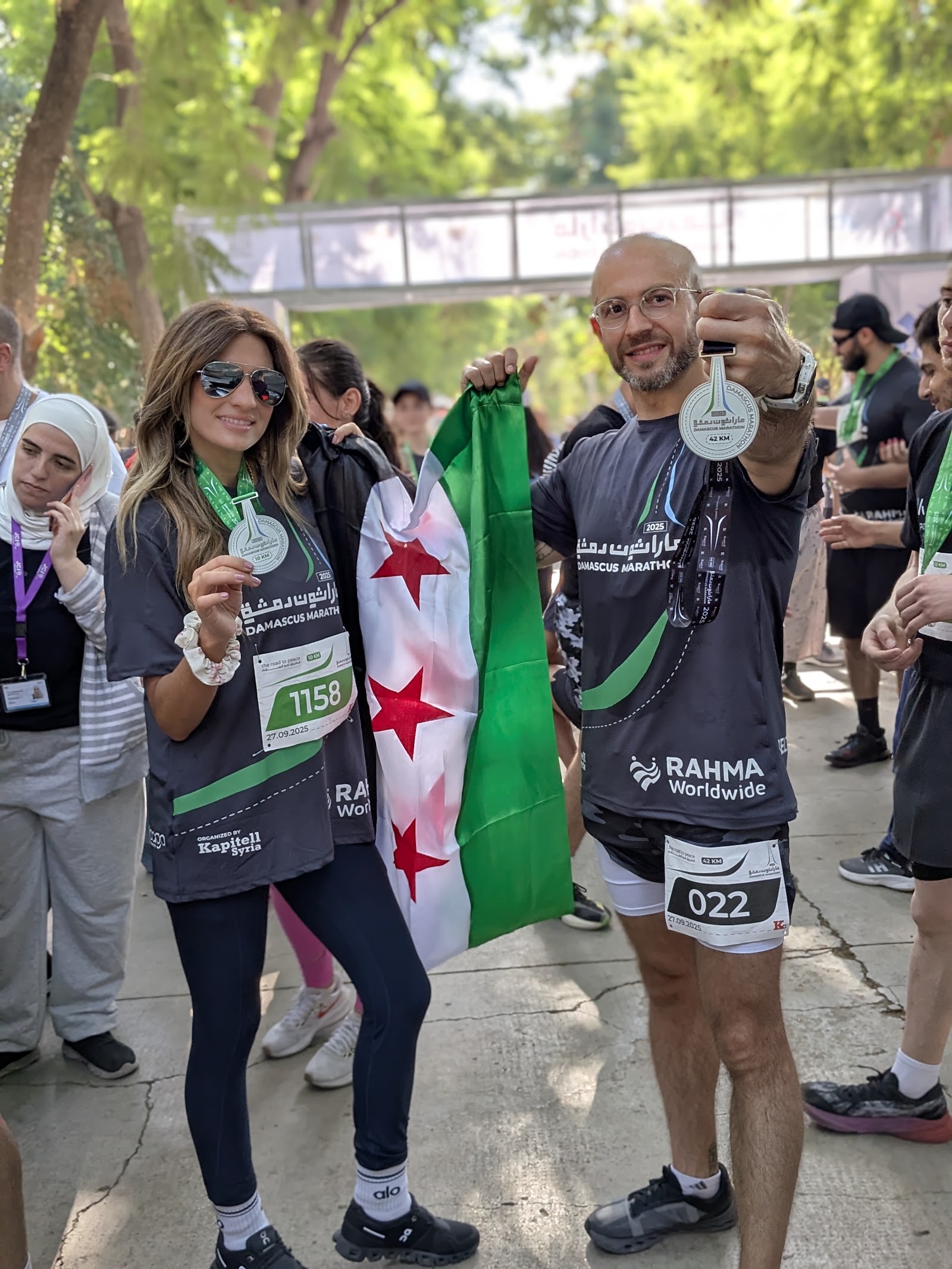 Damascus Marathon finish, 2025 — with the flag